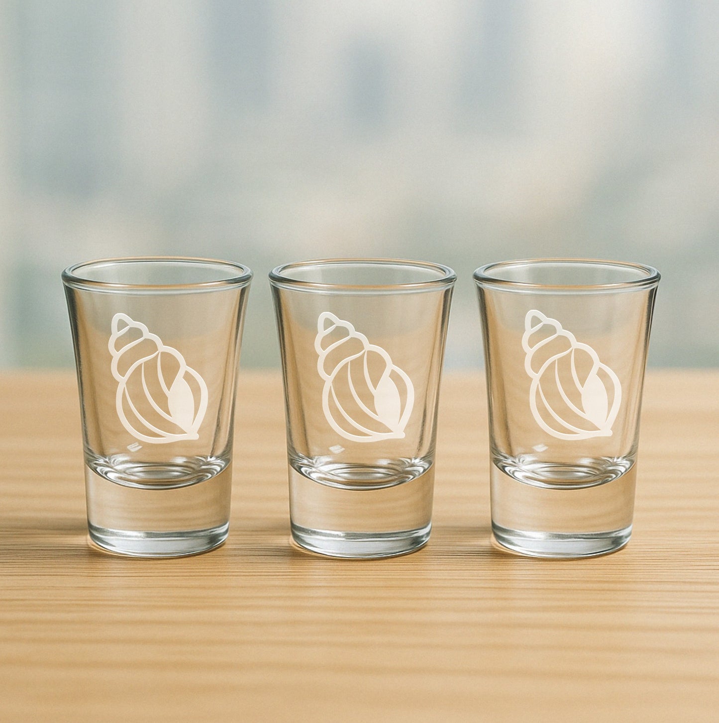 Set of 3 etched shot glasses with swirly seashell design – fun nautical gift for parties, ocean enthusiasts, and beach houses