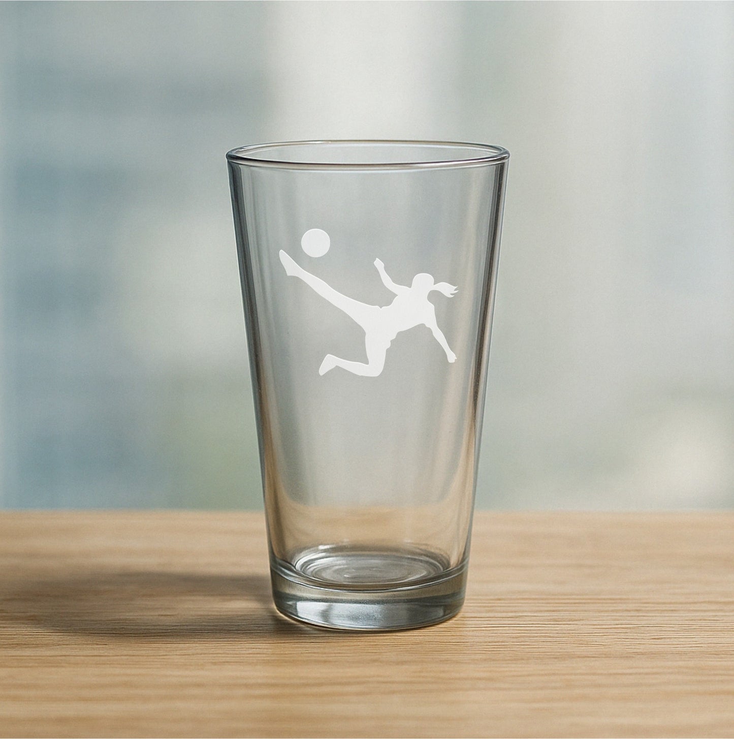 Custom etched pint glass featuring female soccer player design – personalized beer glass gift for soccer athletes, coaches, and sports celebrations