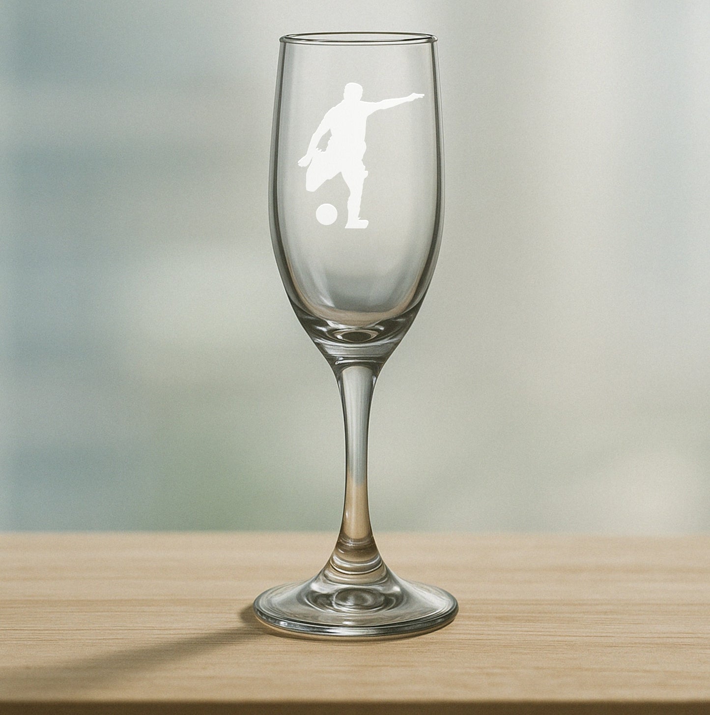 Etched champagne flute with male soccer player silhouette – unique gift for soccer banquets, team celebrations, and athletic milestones