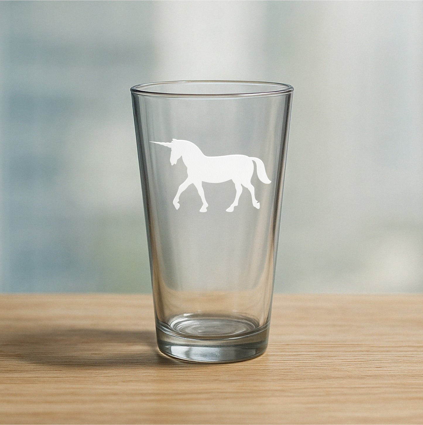 Etched pint glass with magical unicorn design – perfect gift for fantasy lovers, unicorn enthusiasts, and whimsical barware collections