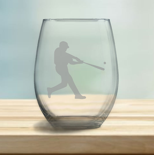 Stemless wine glass with etched baseball player design – perfect gift for baseball enthusiasts, ideal for enjoying wine with a sporty, athletic touch.