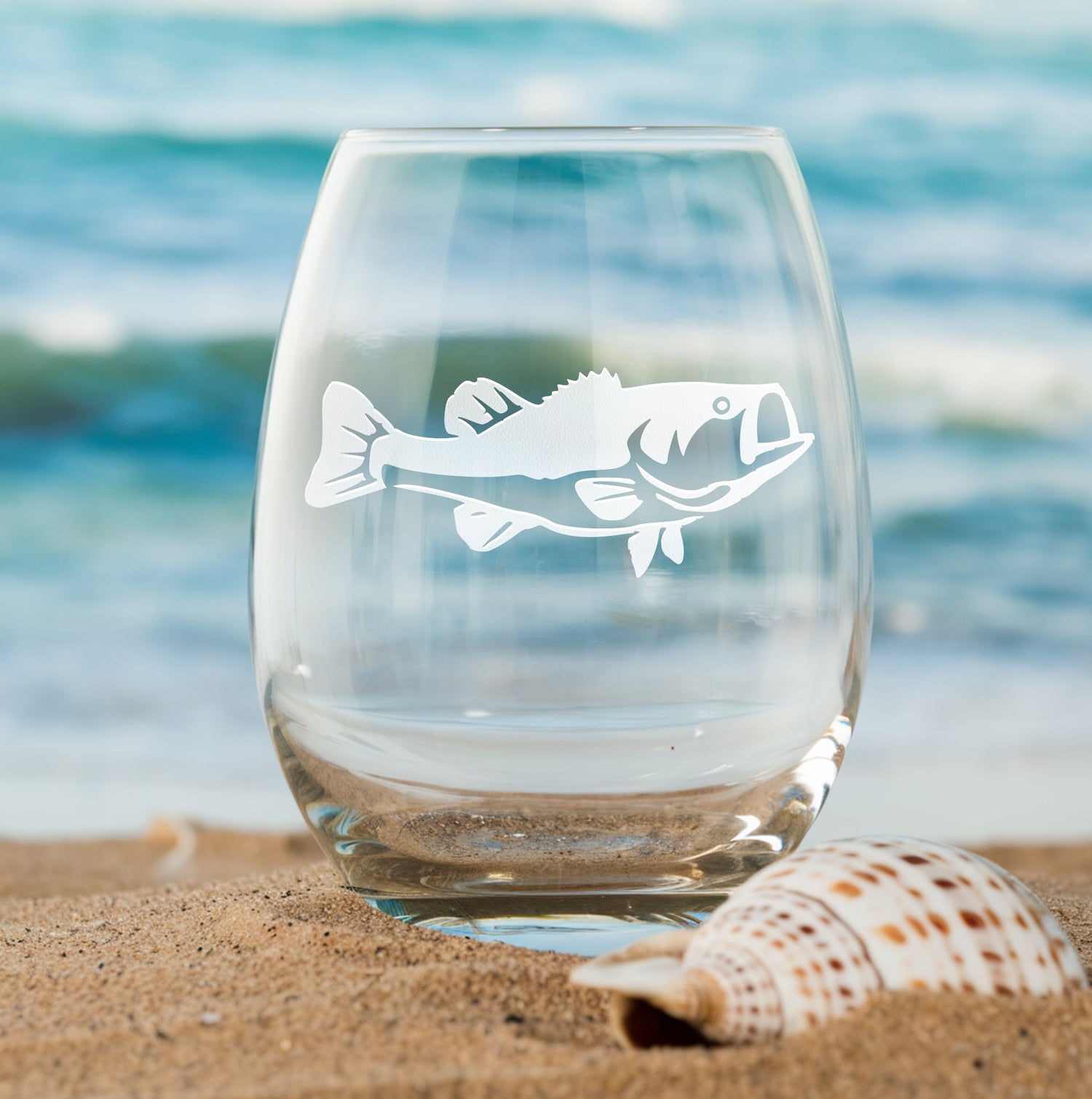 Stemless wine glass with etched bass fish design – perfect gift for fishing enthusiasts, ideal for enjoying wine with an outdoorsy, aquatic touch.