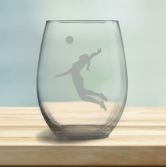 Stemless wine glass with etched female volleyball player design – perfect gift for volleyball enthusiasts, ideal for enjoying wine with a sporty, athletic touch.
