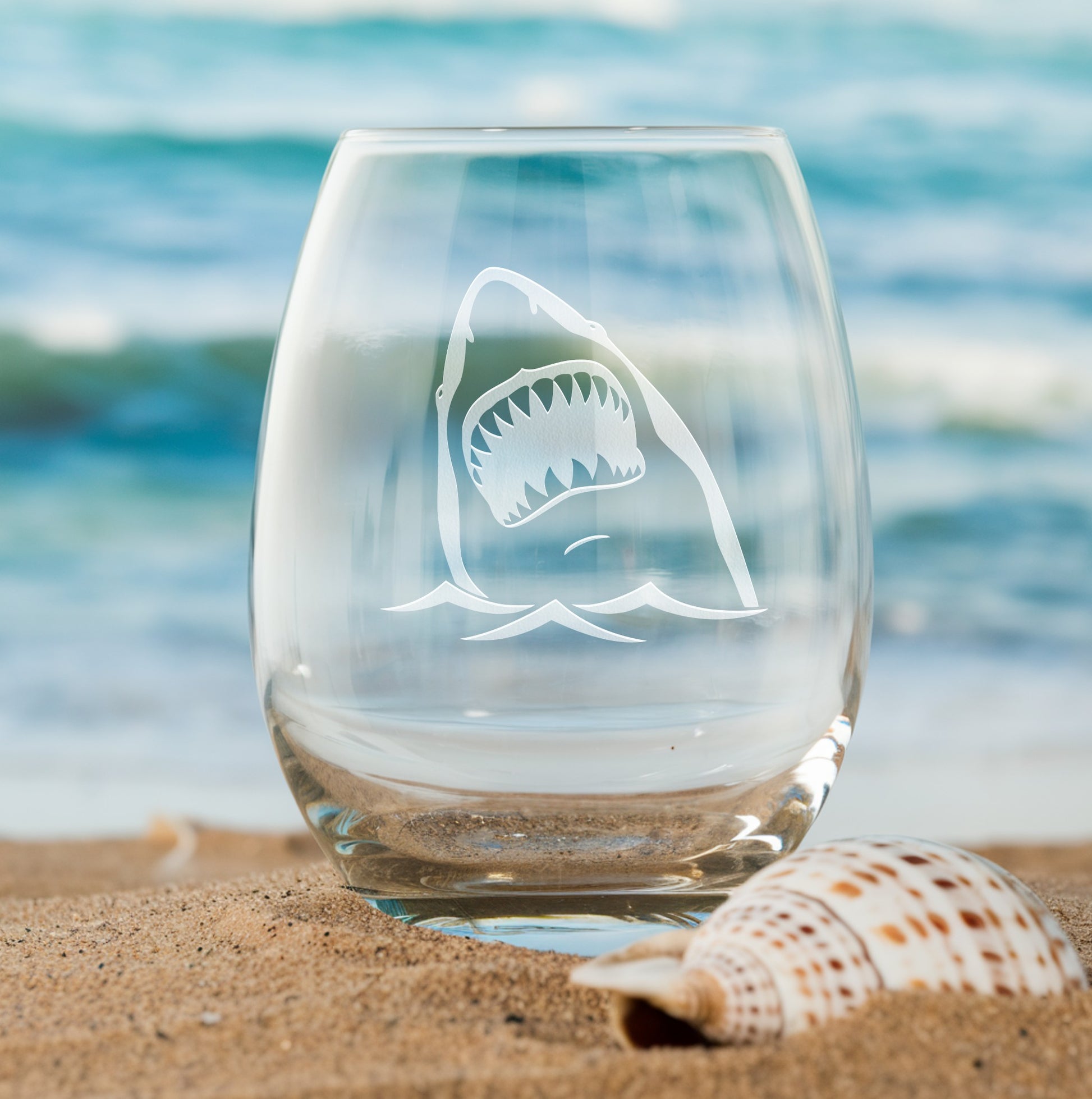 Stemless wine glass with etched shark head design – perfect gift for shark enthusiasts, ideal for enjoying wine with a bold, ocean-inspired touch.
