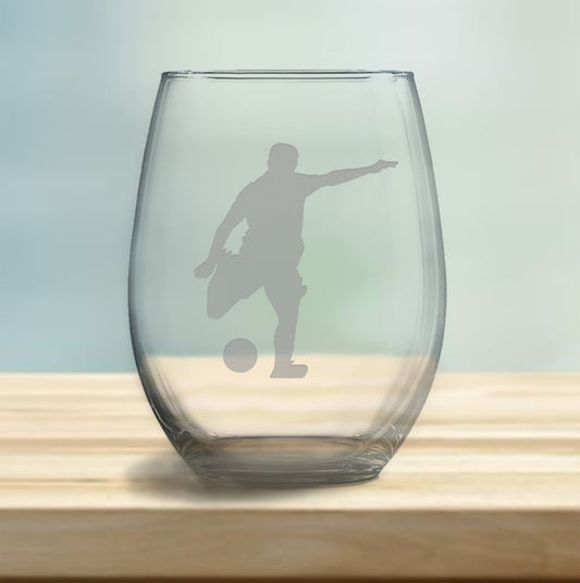 Stemless wine glass with etched male soccer player design – perfect gift for soccer enthusiasts, ideal for enjoying wine with a dynamic, athletic flair.