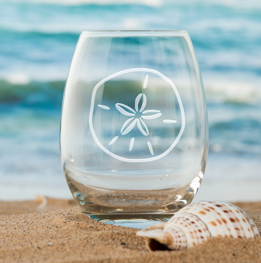 Stemless wine glass with etched sand dollar design – perfect beach lover gift, ideal for wine enthusiasts who love coastal decor.
