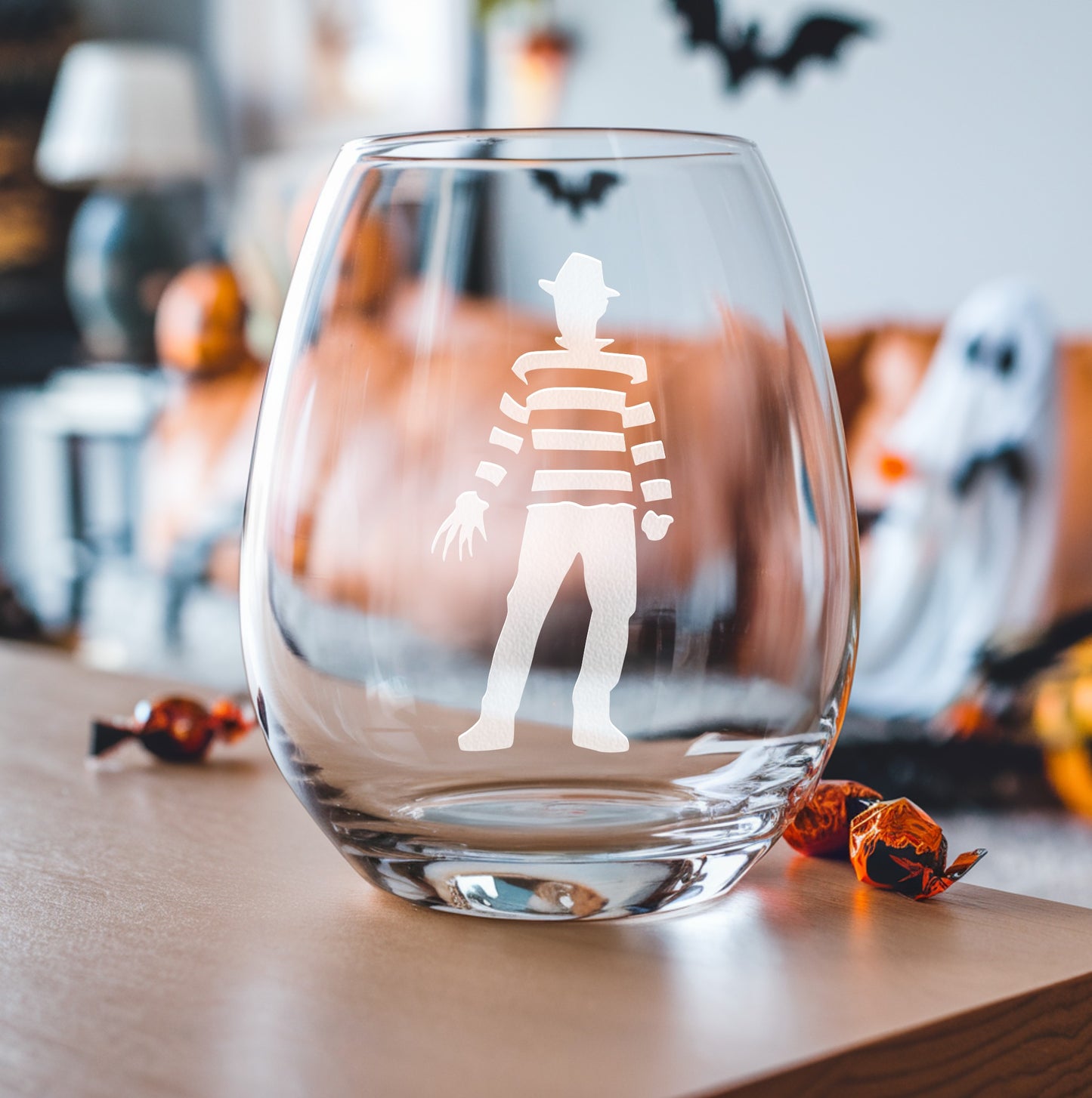 Stemless wine glass with etched horror villain design – perfect gift for horror fans, ideal for enjoying wine with a chilling, villainous touch.