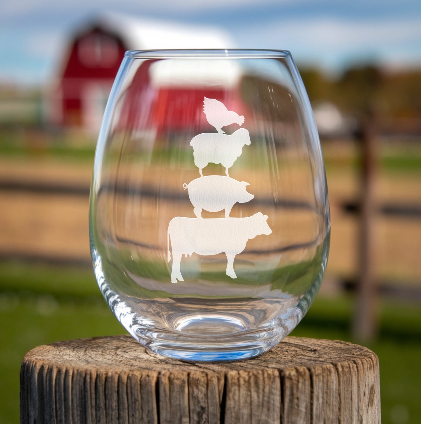 Stemless wine glass with etched stacked farm animals design – a charming chicken, sheep, pig, and cow stacking design, perfect for farmhouse décor, country-themed gifts, and animal lovers.