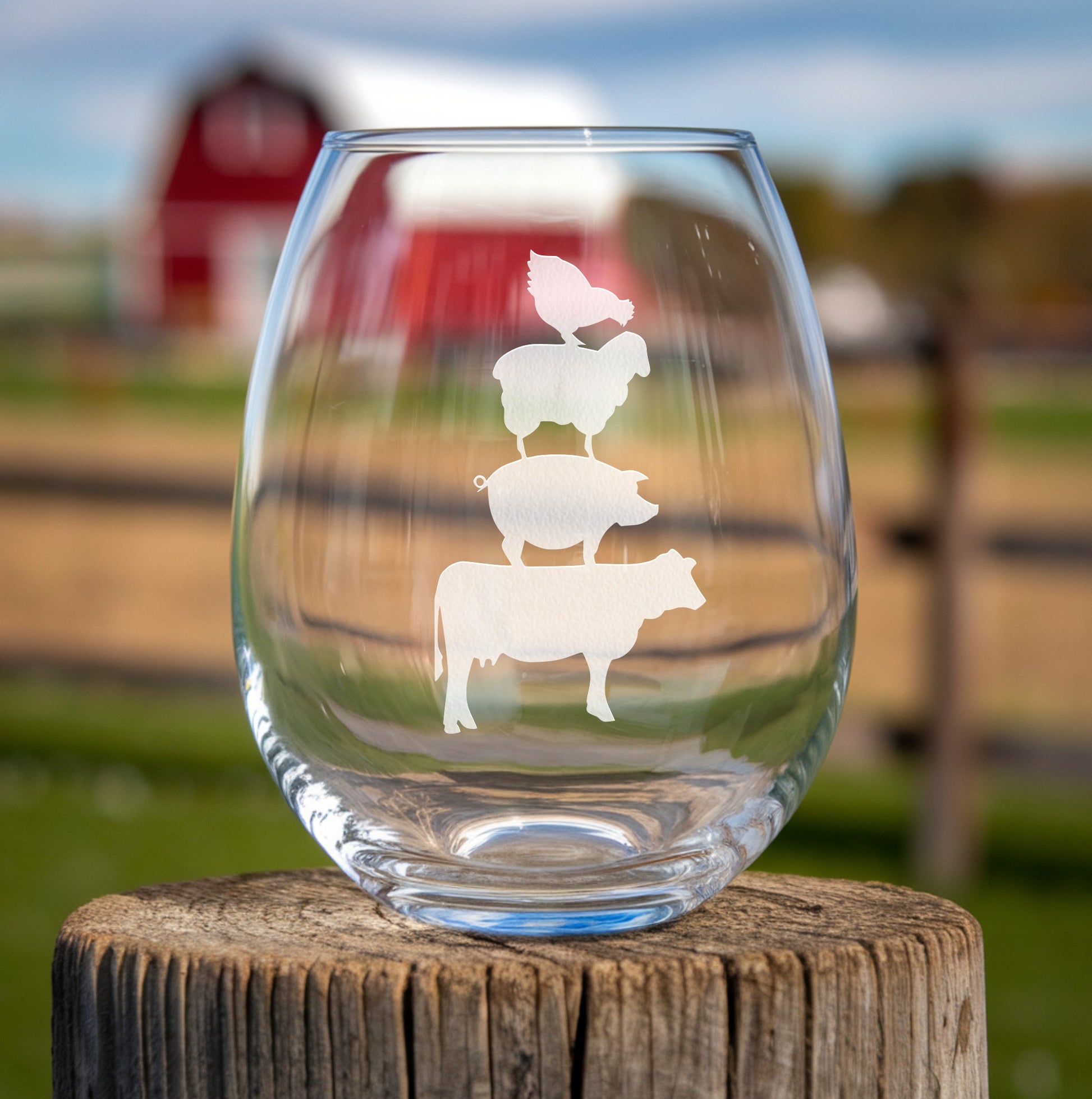 Stemless wine glass with etched stacked farm animals design – a charming chicken, sheep, pig, and cow stacking design, perfect for farmhouse décor, country-themed gifts, and animal lovers.