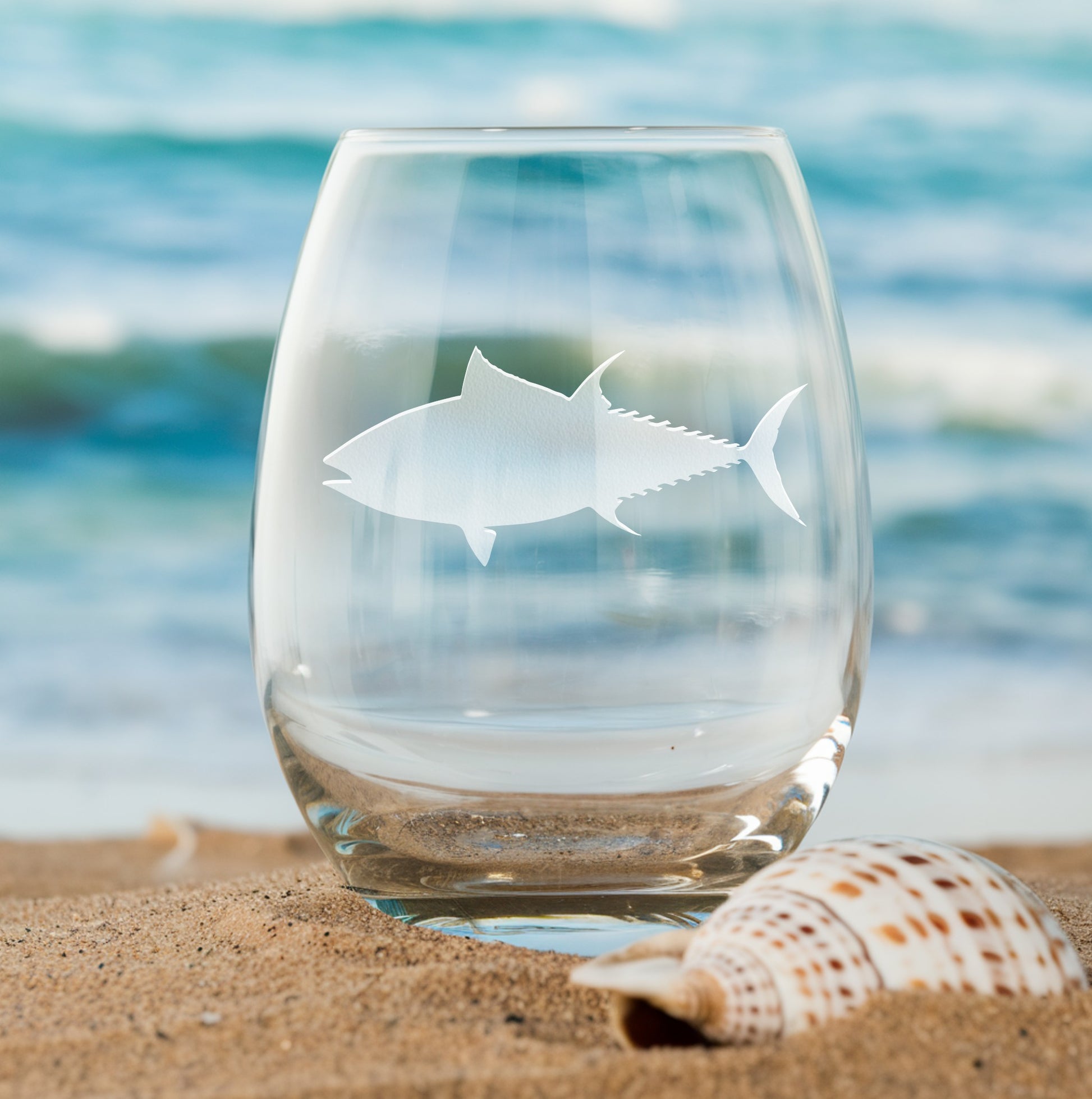 Stemless wine glass with etched tuna fish silhouette – great gift for anglers and ocean lovers, perfect for birthdays and special occasions.