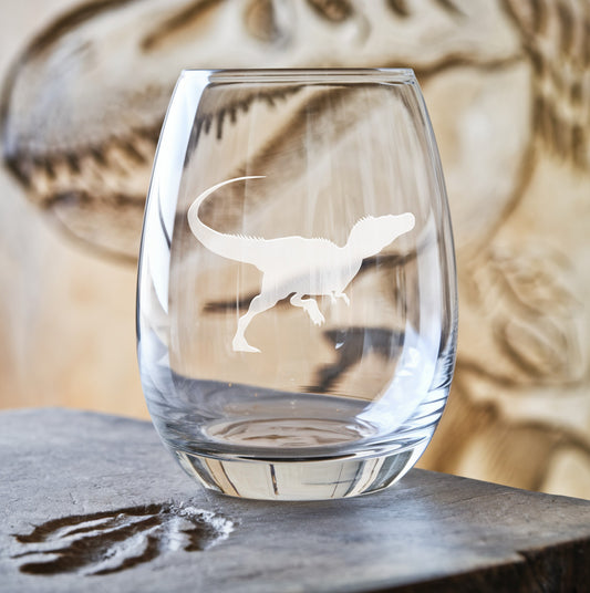 Stemless wine glass with etched Velociraptor design – a thrilling gift for dinosaur enthusiasts, capturing the swift and agile nature of the Velociraptor in intricate detail.