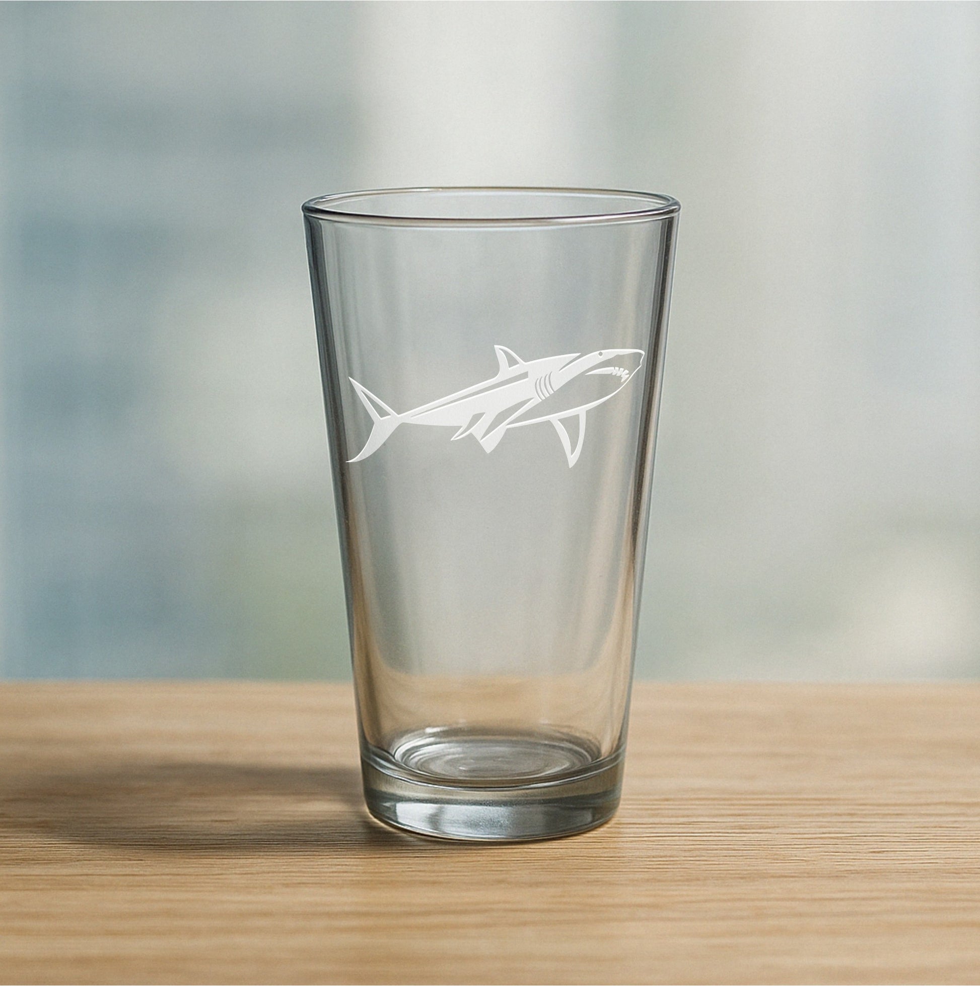 Custom etched pint glass featuring detailed shark design – personalized beer glass gift for ocean lovers and fishing fans